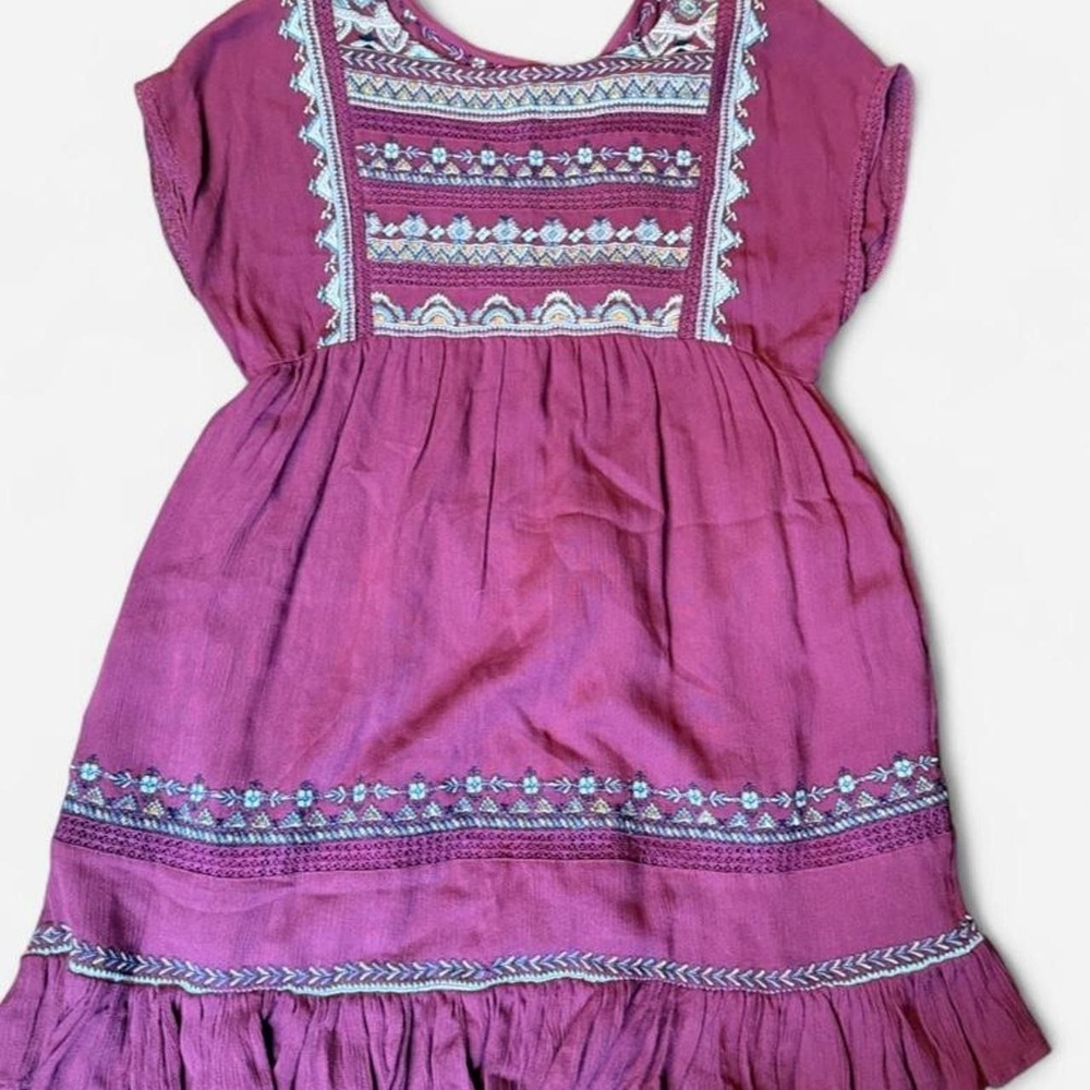 Free People burgundy mini dress with embroidery and lace details. Size: XS